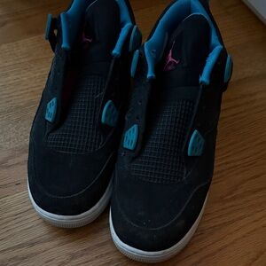 Black, pink, and teal Jordan’s